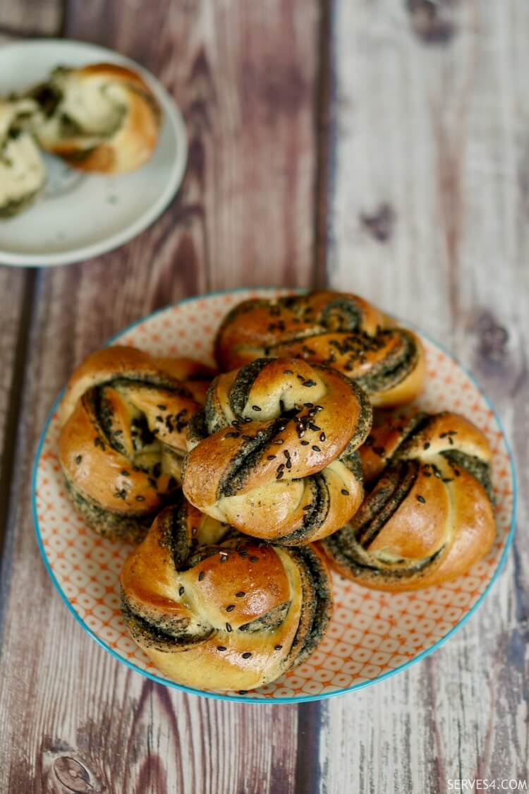 A plate of black sesame buns