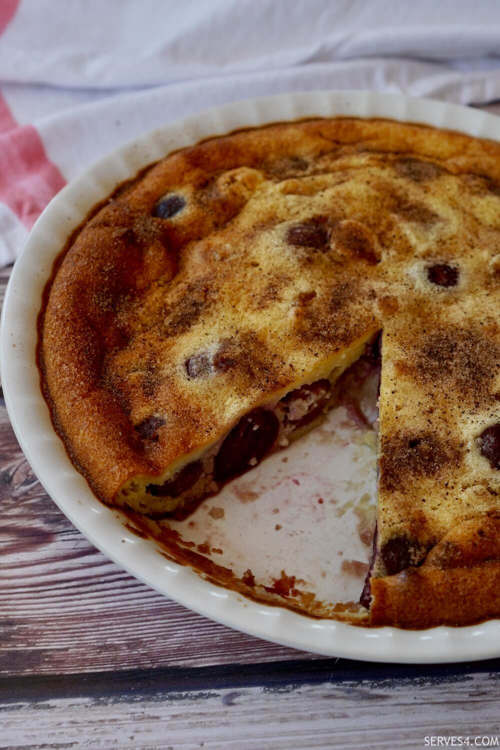 This scrumptious cherry clafoutis is super easy to make and the best way to make the most of the short but marvellous cherry season!