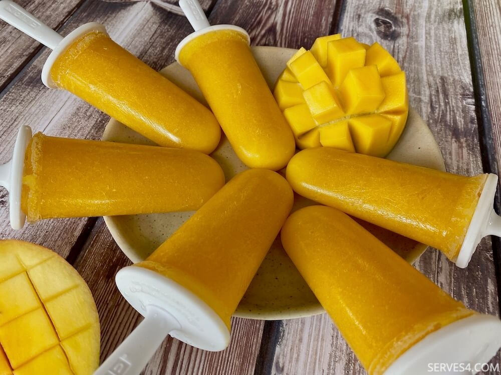 With the weather heating up, these super easy mango ice pops are just to thing to cool and refresh.