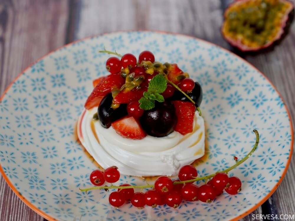 This gorgeous mini pavlova recipe is the perfect individual sized summer dessert that is bursting with texture and fruity flavour!