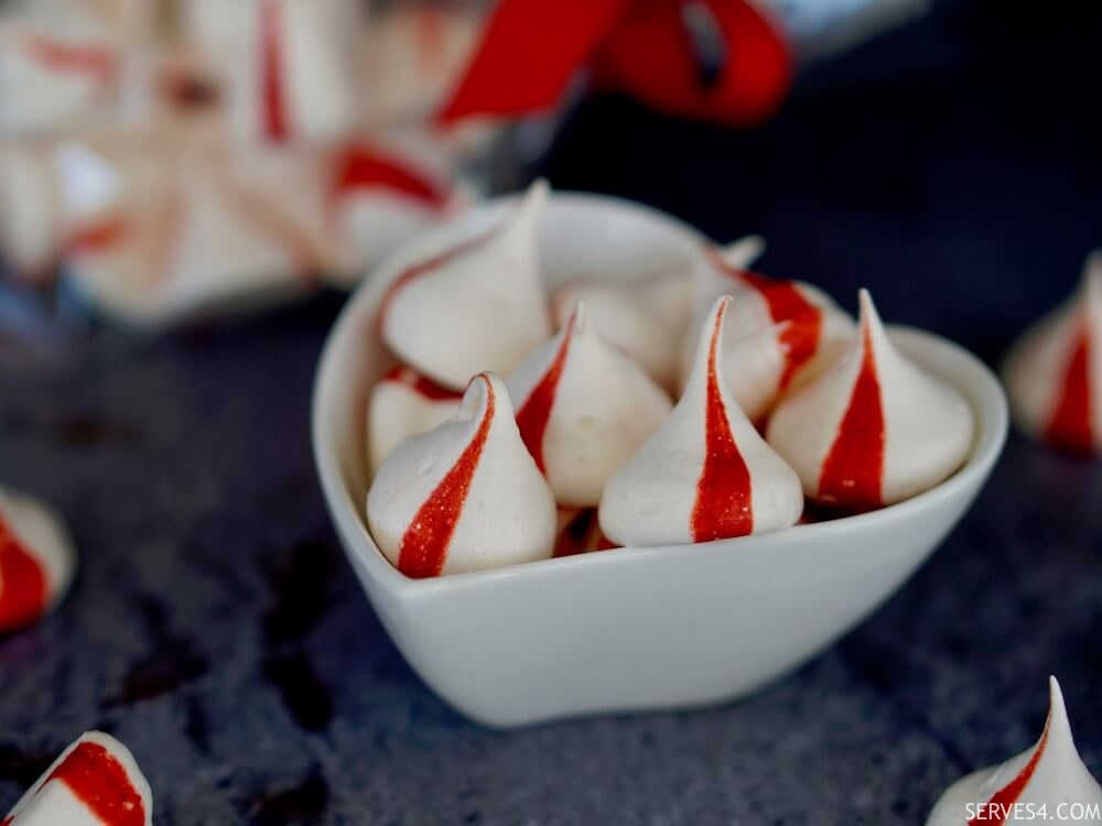 These peppermint meringue kisses make an ideal festive sweet treat - make them as gifts, or save them for yourself!