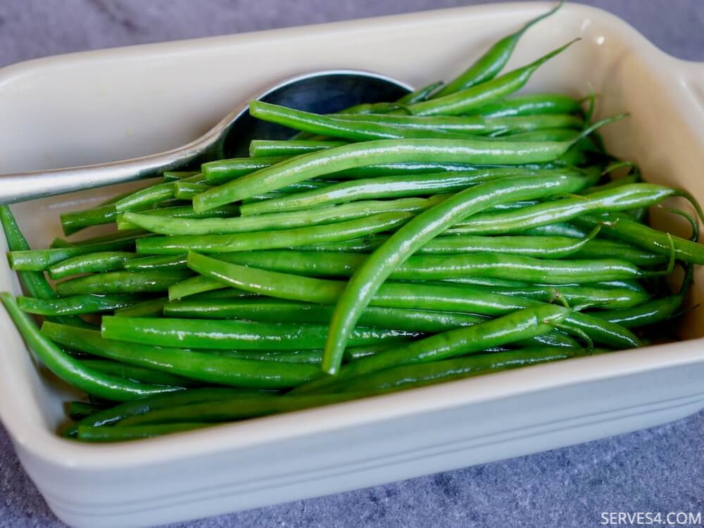 This simple green beans in olive oil dish is an easy way to get your greens into any meal.