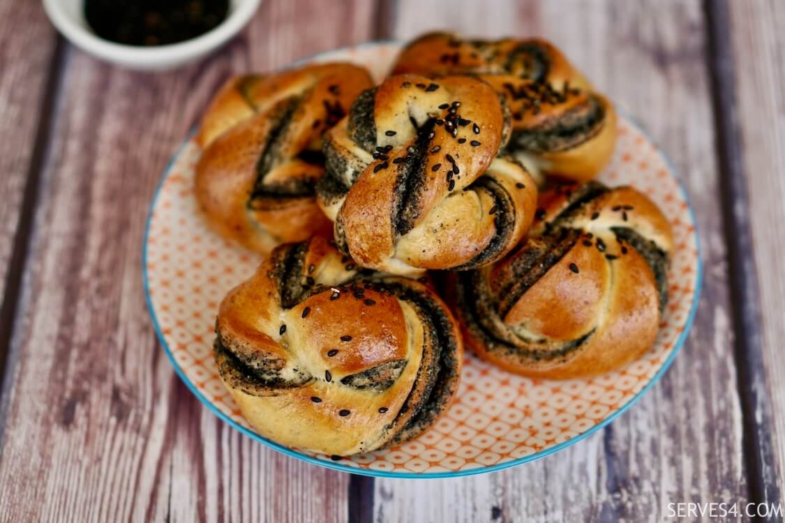 Black sesame buns on a plate