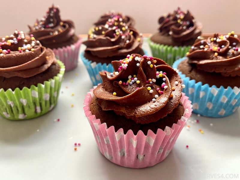 These chocolate cupcakes with chocolate buttercream are a chocolate lover's dream - light and airy chocolate sponge topped with velvety creamy chocolate icing!