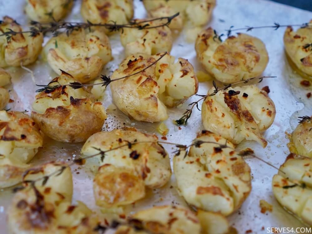 These garlic smashed potatoes are easy to make, taste delicious and pair well with just about any meal.