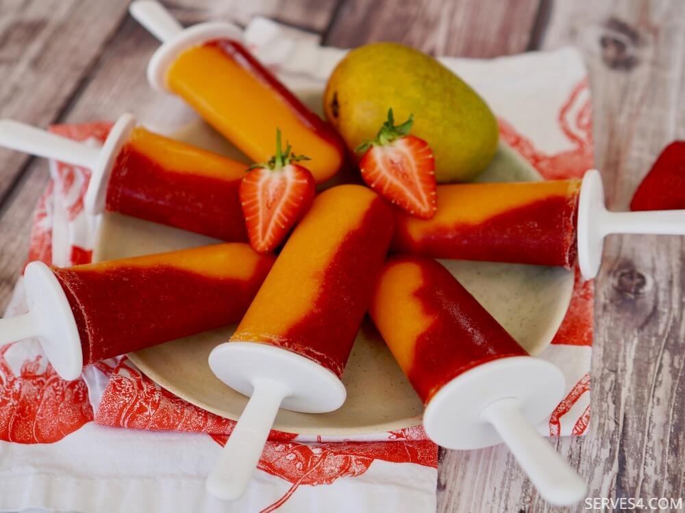 These homemade ice pops with mango and strawberry combine our two favourite flavours into one deliciously refreshing snack!