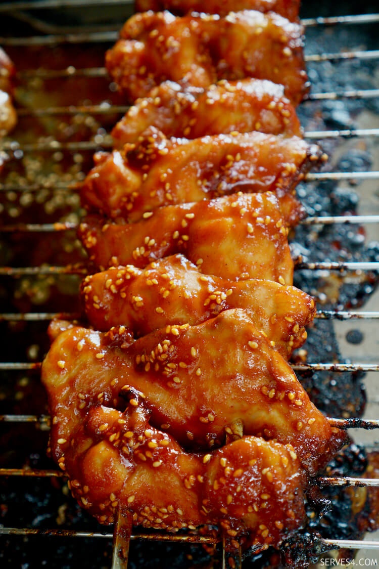 making grilled Korean chicken, spicy and non-spicy