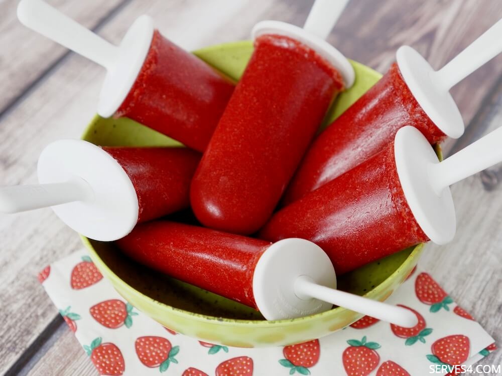 To make the best strawberry ice pops, all you need are some sweet, in season strawberries!